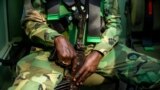 FILE - A U.N. peacekeeper holds his weapon while on patrol in Paoua, Central African Republic, Dec. 5, 2021.