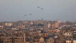 Humanitarian aid is dropped by the United States over Gaza City, Gaza Strip, March 2, 2024.
