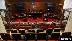 FILE - The Legislative Yuan sits empty in Taipei, Taiwan, May 17, 2016. The possibility of a China-born candidate for the Taiwanese legislature is raising concerns about nominees' loyalties.
