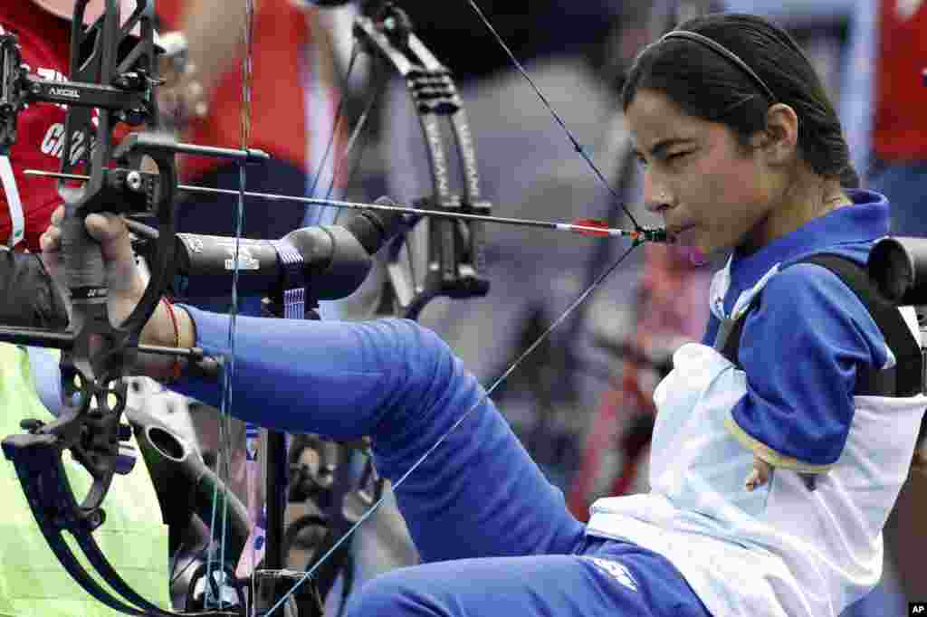 Archer Sheetal Devi from India prepares to fire during the Paralympic Games in Paris, France.