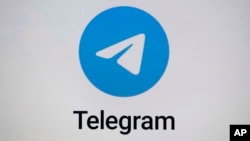 FILE - The logo for the Telegram messaging app is seen on a notebook screen in Munich, Oct. 17, 2022.