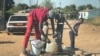 Residents of Sizinda, urban Bulawayo, Zimbabwe, fetching water from a borehole. (Umfanekiso: Chris Gande)