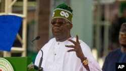 In this photo released by the Nigeria State House, Nigeria's new President Bola Ahmed Tinubu, speaks after taking an oath of office at a ceremony in Abuja, Nigeria, May 29, 2023.