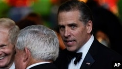 Hunter Biden talks with guests during a State Dinner for India's Prime Minister Narendra Modi at the White House, June 22, 2023.