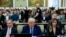 Flanked by his attorneys Chris Kise, left, and Alina Habba, former President Donald Trump waits to take the witness stand at New York Supreme Court on Monday November 6, 2023, in New York. 