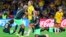 Nigeria's Onome Ebi, left, and Nigeria's Osinachi Ohale celebrate at the end of the Women's World Cup Group B soccer match between Australia and Nigeria In Brisbane, Australia, July 27, 2023. Ohale scored once and Nigeria won 3-2.