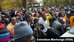 Demonstrators gather outside Harare Magistrates Court in June 2024. The protest led to the arrest of more than 100 activists, as the country prepares to host the Southern African Development Community summit on Aug. 17, 2024. 