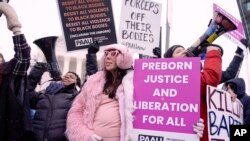 Anti-abortion activists participate in the annual March for Life in front of the Supreme Court on Jan. 19, 2024, in Washington.