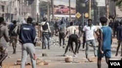 FILE - Protesters clash with police in Dakar, Senegal, June 2, 2023, after opposition leader Ousmane Sonko was sentenced to two years in prison. (Annika Hammerschlag/VOA)