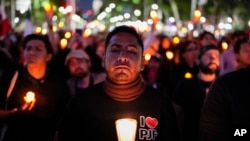 A unionized federal court worker protests against reforms that would make all judges stand for election in Mexico City, Aug. 26, 2024.