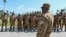 FILE - Soldiers from Burkina Faso's army line up for training organized by the International Counter-Terrorism Academy in Jacqueville, Ivory Coast, March 14, 2023. 
