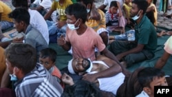 Newly arrived Rohingya refugees rest at a local prayer hall in Kulee, Aceh, Indonesia, Nov. 19, 2023. 