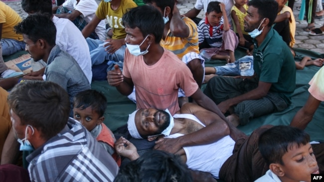 Newly arrived Rohingya refugees rest at a local prayer hall in Kulee, Aceh, Indonesia, Nov. 19, 2023.
