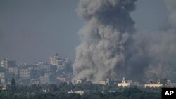 Smoke rises following an Israeli airstrike in the Gaza Strip, as seen from southern Israel, Nov. 1, 2023.