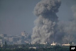 Smoke rises following an Israeli airstrike in the Gaza Strip, as seen from southern Israel, Nov. 1, 2023.