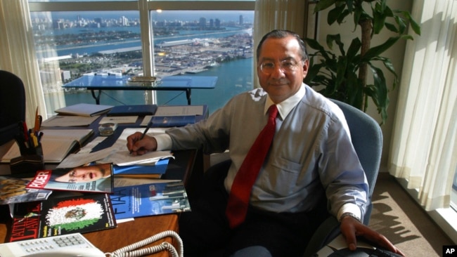 FILE - Manuel Rocha sits in his office at Steel Hector & Davis in Miami in January 2003.