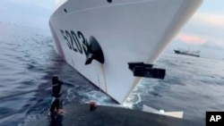 This image shows a Chinese coast guard ship with bow number 5203 after bumping a Filipino supply boat as they approach Second Thomas Shoal in South China Sea on Sunday Oct. 22, 2023. (Armed Forces of the Philippines via AP)