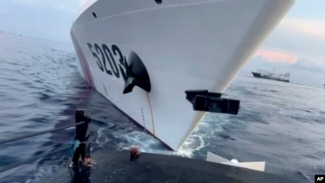 This image shows a Chinese coast guard ship with bow number 5203 after bumping a Filipino supply boat as they approach Second Thomas Shoal in South China Sea on Sunday Oct. 22, 2023. (Armed Forces of the Philippines via AP)