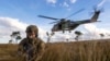 FILE - In this photo provided by the Australian Defense Force, soldiers dismount from an MRH-90 Taipan during an exercise in Queensland, June 12, 2023. (LCPL Riley Blennerhassett/ADF via AP)