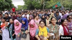 Protesters gather at the High Court premises demanding the resignation of Obaidul Hassan, chief justice of Bangladesh, in Dhaka, Aug. 10, 2024.