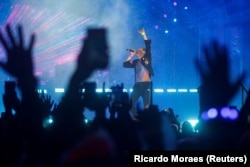 Chris Martin vokalis band Inggris Coldplay tampil dalam festival musik Rock in Rio di Rio de Janeiro, Brazil, 11 September 2022. (Foto: REUTERS/Ricardo Moraes)