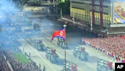 FILE- Photo by North Korean government, shows reported rocket launchers in a military parade marking 70th anniversary of end of Korean War, Pyongyang, North Korea, July 27, 2023.