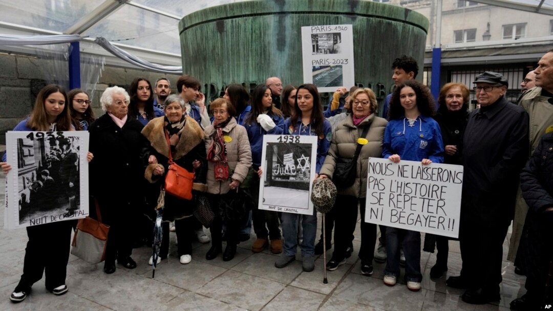 Activists attend a gathering in the Paris Holocaust memorial to sound the alarm about resurgent antisemitism linked to the Israel-Hamas war, in Paris, Nov. 18, 2023.