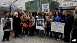 Activists attend a gathering in the Paris Holocaust memorial to sound the alarm about resurgent antisemitism linked to the Israel-Hamas war, in Paris, Nov. 18, 2023.
