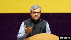 FILE - India's Minister for Information Technology Ashwini Vaishnaw addresses the audience during the 'SemiconIndia 2023' in Gandhinagar, July 28, 2023. Vaishnaw said the cybersecurity agency is investigating complaints of mobile phone hacking by senior opposition politicians.