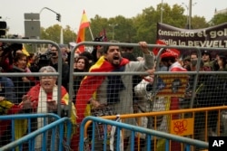 People protest the investiture of Spain's acting Prime Minister Pedro Sanchez after he was chosen by a majority of legislators to form a new government in the Spanish Parliament in Madrid, Spain, Nov. 16, 2023.