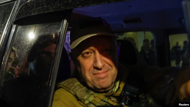 Wagner mercenary chief Yevgeny Prigozhin leaves the headquarters of the Southern Military District amid the group's pullout from the city of Rostov-on-Don, Russia, June 24, 2023.