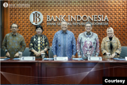 Gubernur Bank Indonesia (BI) Perry Warjiyo (tengah). Foto: BI