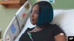 FILE - This July 2019 image provided by the Sarah Cannon Research Institute shows Victoria Gray during a gene-editing trial for sickle cell disease. Gray was the first patient to test the treatment. (Anthem Pictures/Sarah Cannon Research Institute via AP, File)