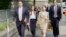 FILE - Charlie Javice, second from left, founder of a student loan assistance startup company charged with fraud, arrives at federal court with her legal team, in New York, June 6, 2023.