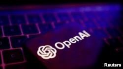 FILE - The OpenAI logo is seen against the backdrop of a keyboard in this illustration photo taken May 20, 2024.