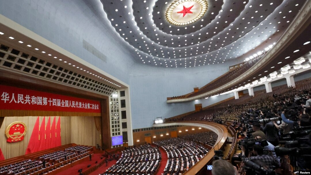 Chinese officials and delegates attend the closing session of the National People's Congress (NPC) at the Great Hall of the People in Beijing, China, March 11, 2024. 