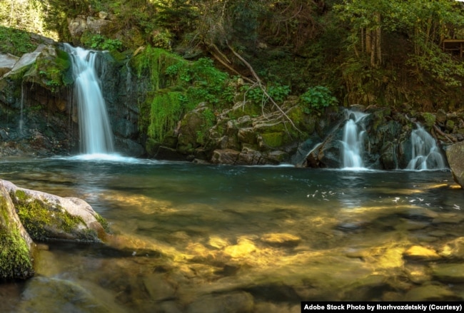 FILE - Kmyanets waterfall in the Skolivsky Beskydy National Park in the Carpathian Mountains. (Adobe Stock Photo by Ihorhvozdetskiy)