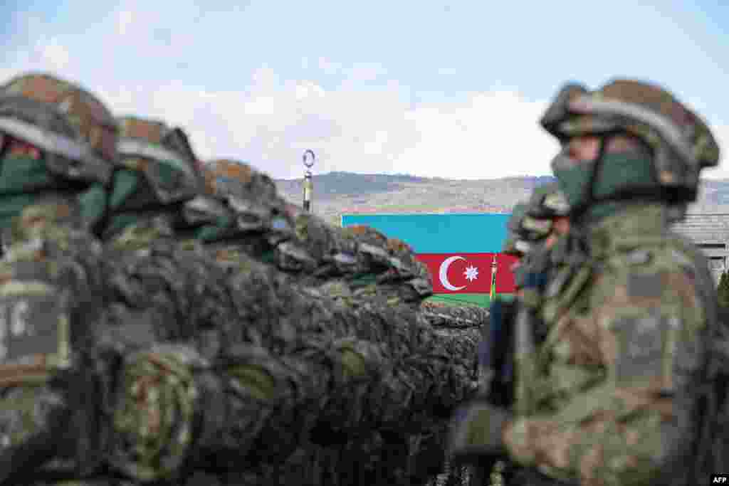 A military parade in the town of Stepanaker (Khankendi), in Nagorno-Karabakh region, in this handout photograph taken and released by Azerbaijani Presidential Press Office.