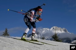 FILE — Joanne Reid of the United States competes during the women 7.5km sprint competition at the Biathlon World Cup race in Hochfilzen, Austria, Dec. 8, 2022.