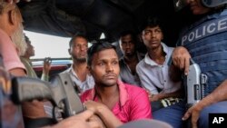 Police detain activists of main opposition Bangladesh Nationalist Party who were trying to enforce a three-day blockade in Dhaka, Oct.31, 2023.