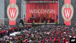 FILE - The commencement address is given during graduation at the University of Wisconsin in Madison, Wis., on May 12, 2018.