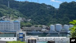 FILE - Taiwan military vessels are seen in Keelung Harbor in Taiwan on Aug. 4, 2022. 