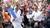 Anies Baswedan dan istrinya, Fery Farhati, memulai kampanye hari pertama di Kampung Tanah Merah, Jakarta Utara Selasa (28/11). (courtesy: TPN Anies-Muhaimin)