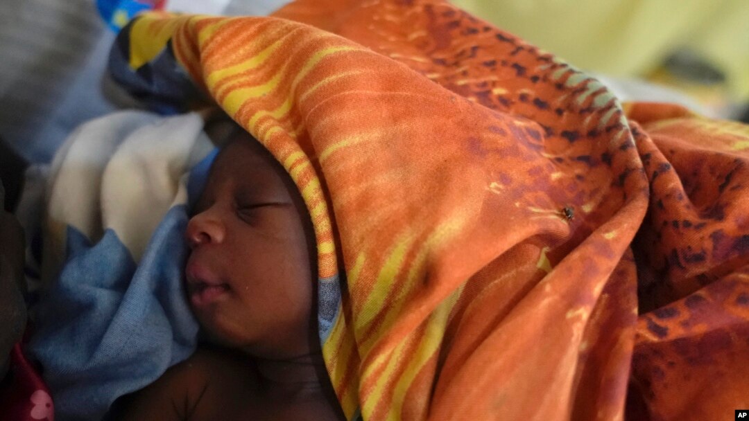 A newborn lies on a bed in the Doctors Without Borders-run hospital in Bentiu, South Sudan, June 24, 2024. South Sudan's health system suffers, even though the relative peace gives many women easier access to care.