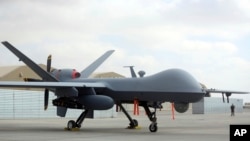 FILE - A U.S. MQ-9 drone is shown on display at Kandahar Airfield, Afghanistan, Jan. 23, 2018. An MQ-9 was hit but recovered Sept. 9, 2024, while operating in the Middle East, a U.S. defense official told VOA on Sept. 13.