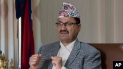 Nepal's Foreign Minister Narayan Prakash Saud speaks to the Associated Press during an interview at his office in Kathmandu, Jan. 25, 2024. 