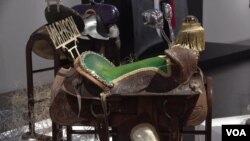 Horse saddle celebrations at "Desert Rider: Dreaming in Motion" exhibition