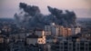 FILE - Smoke rises following an Israeli airstrike in Gaza City on Wednesday, October 11, 2023. 