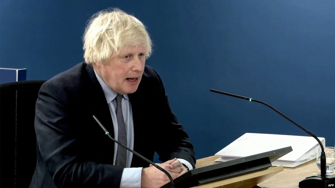 A video grab from footage broadcast by the UK Covid-19 Inquiry shows Britain's former Prime Minister Boris Johnson speaking at the UK COVID-19 Inquiry, in west London, Dec. 6, 2023 to give evidence.
