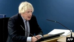 Cuplikan video dari rekaman yang disiarkan oleh Penyelidikan COVID-19 Inggris menunjukkan mantan Perdana Menteri Inggris Boris Johnson berbicara di Penyelidikan COVID-19 Inggris, di London barat, 6 Desember 2023 untuk memberikan bukti.